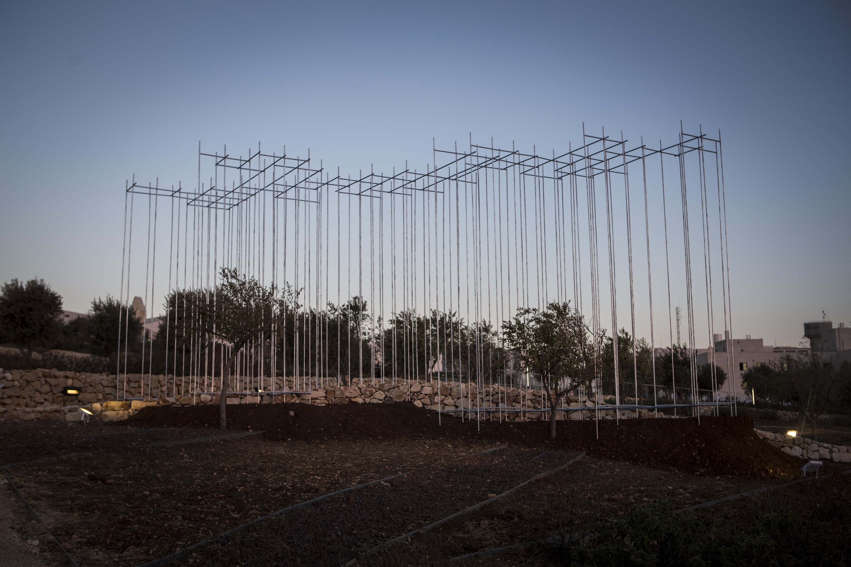 Rain Wu and Eric Chen, Threshold of Being, 2017. Galvanized steel, Jerusalem stone, timber, 1,200 x 300 x 500 cm. Photo by Ziad Trad. © The Palestinian Museum.