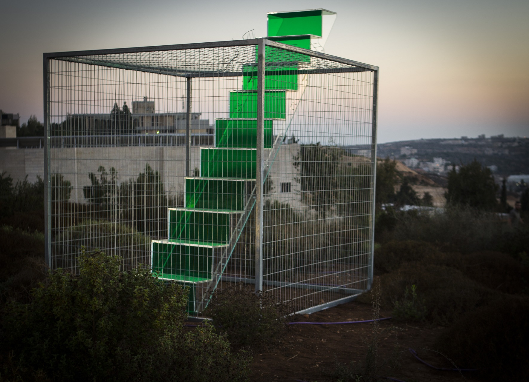 Vera Tamari, Home, 2017. Plexiglas, iron, wire screen, 275 x 275 x 275 cm. Photo by Ziad Trad. © The Palestinian Museum.