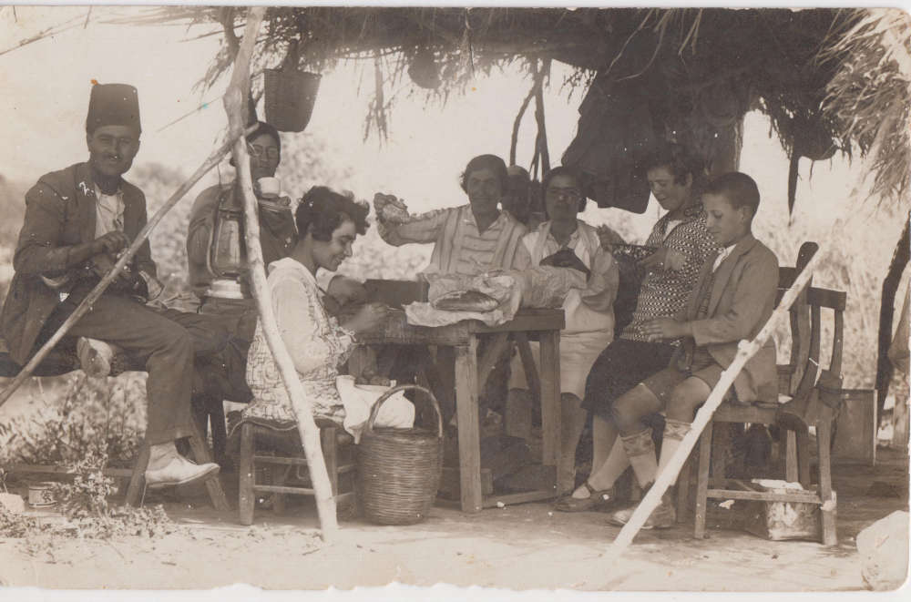 An Arab family on a picnic, a photograph taken by Karimeh Abboud in 1926.