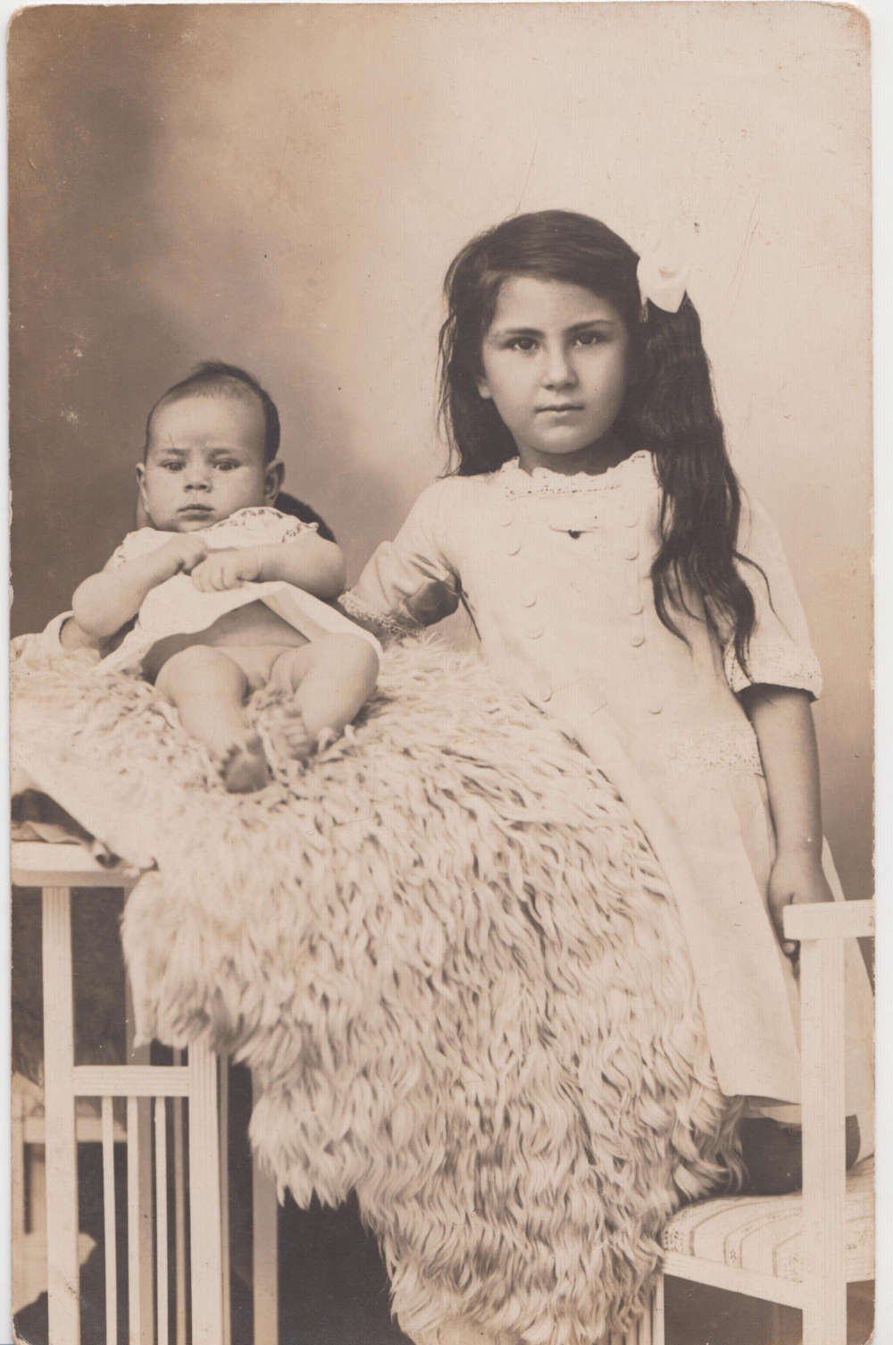 A children studio portrait by Karimeh Abboud.