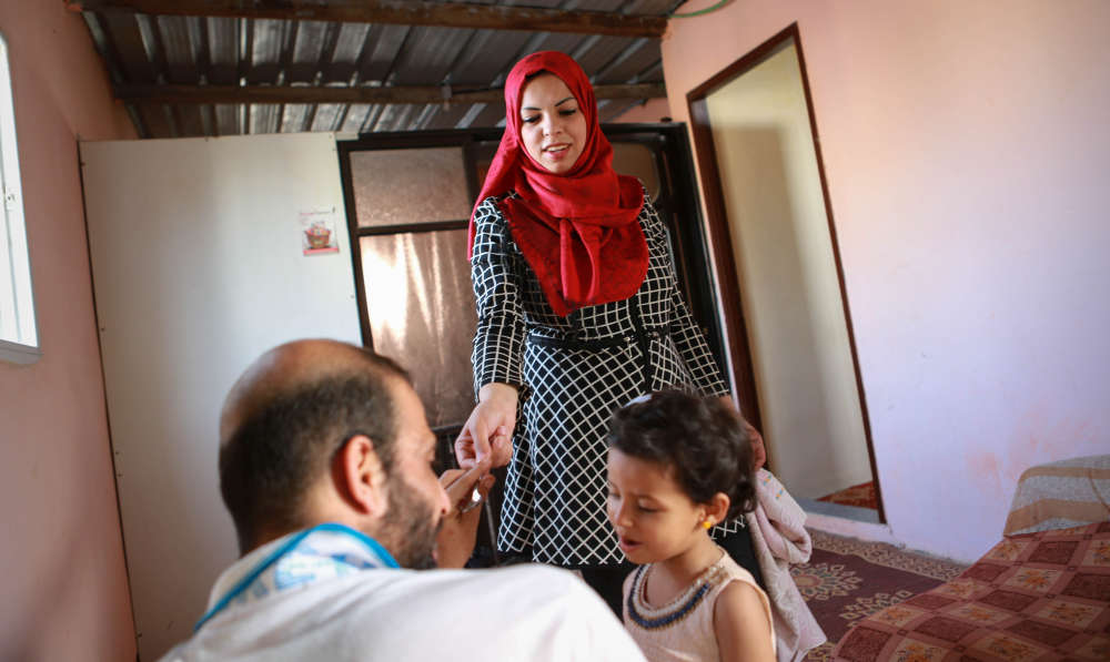 Research shows that the entire family benefits when fathers get involved in taking care of children and housework. Photo courtesy of UN Women.